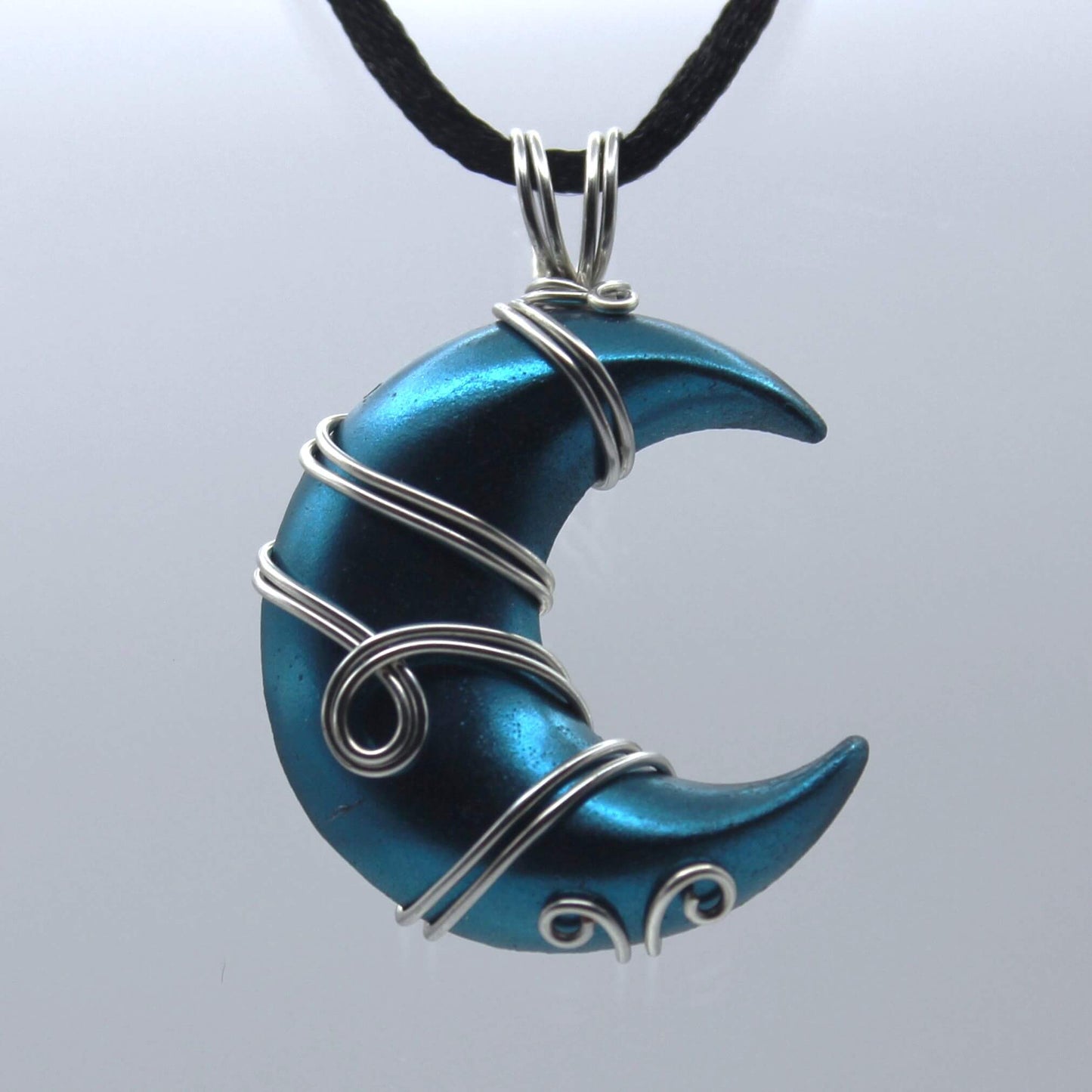 Blue and Silver Resin Moon Wire Wrapped Pendant