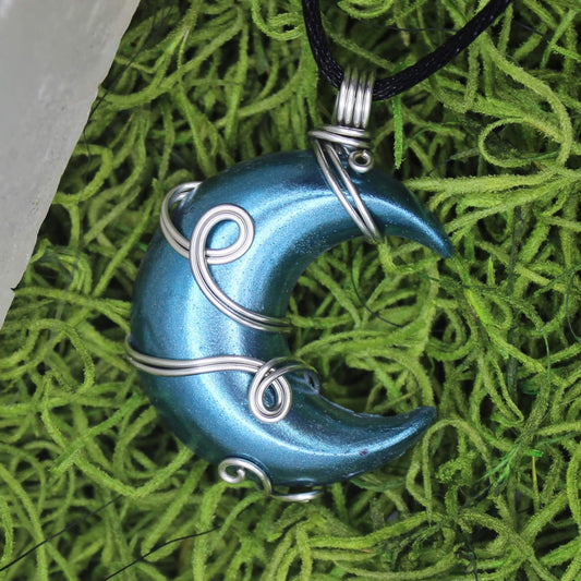 Light Blue and Silver Resin Moon Wire Wrapped Pendant